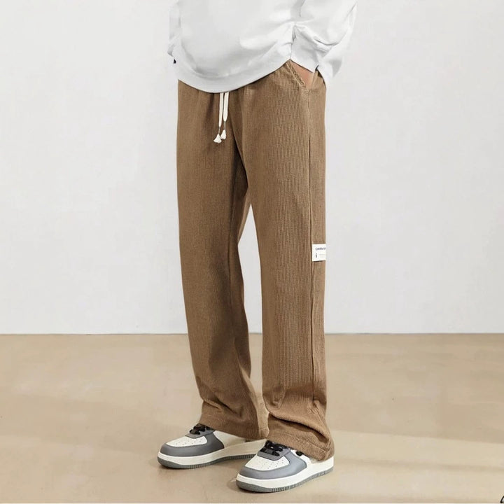 Herren Weite Cordhose im Relaxed-Fit mit Tunnelzug, geradem Bein & Label‑Patch Drune