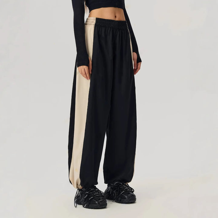 Damen sportliche Freizeithose mit angesagtem Schnitt und seitlichen Kontrastpanelen Drune