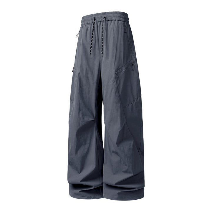 Herren Oversize-Utility-Cargo-Hose aus leichtem Nylon mit elastischem Kordbund, seitlichen Reißverschlusstaschen & weiter Ballon-Silhouette Drune