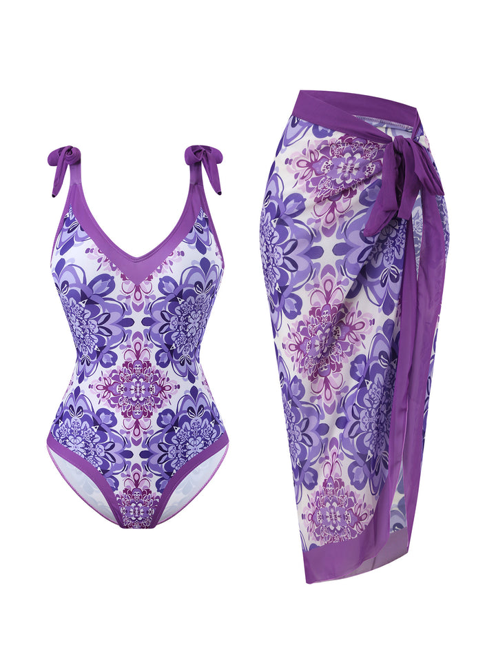 Damen Badeanzug mit floralem Design und transparentem Wickelrock Drune