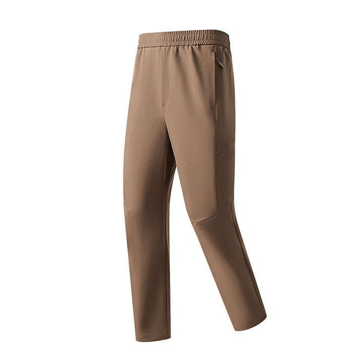 Herren Technische tapered Trainingshose mit elastischem Bund, 4‑Wege‑Stretch und Reißverschlusstaschen Drune