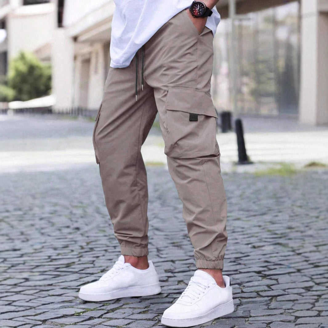 Herren technische Travel-Joggerhose mit integriertem Sicherheitsfach elastischem Tunnelzugbund und wasserabweisender Beschichtung Drune