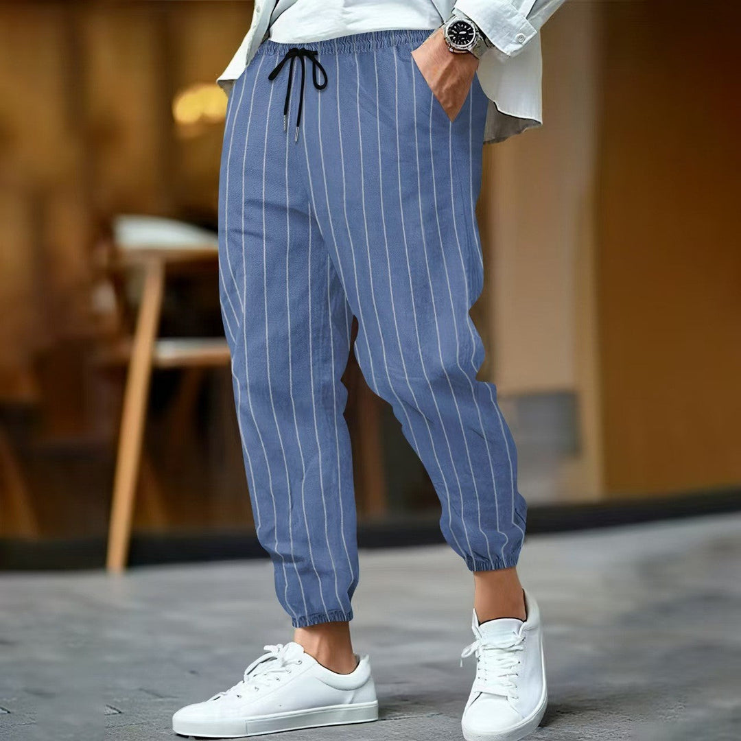 Drune | Relaxed Passform Elastischer Bund mit Kordelzug Schmal Zulaufende Beine Baumwollmischung