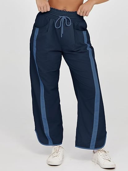Damen nan relaxte Trackpants mit seitlichem Kontraststreifen, elastischem Smokbund und Eingrifftaschen Drune