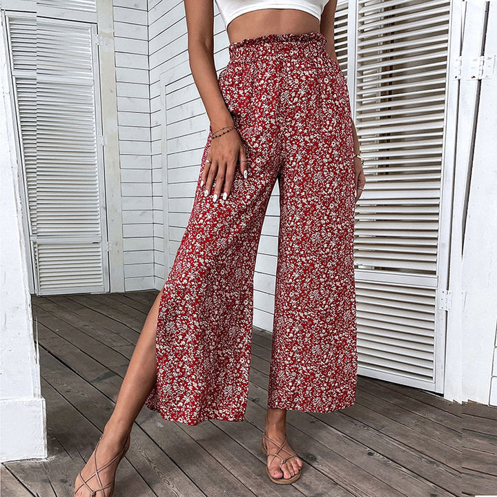 Damen Weite hochgeschnittene Palazzo‑Hose mit floralem Muster und seitlichem Beinschlitz Drune