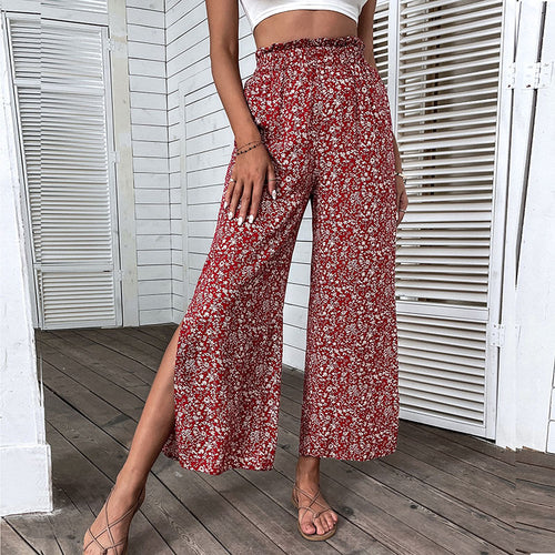 Damen Weite hochgeschnittene Palazzo‑Hose mit floralem Muster und seitlichem Beinschlitz Drune