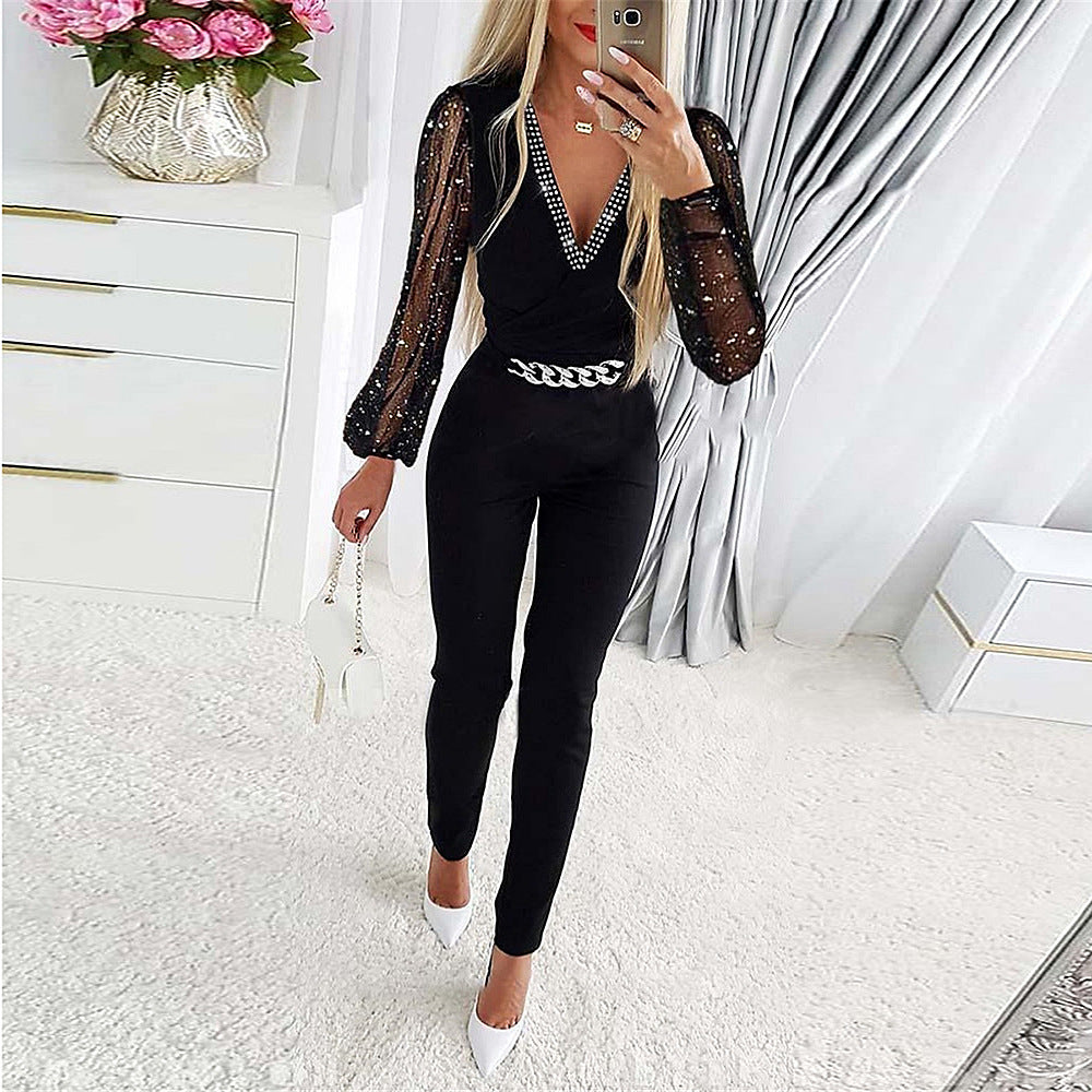 Drune | Jumpsuit Slim Passform V-Ausschnitt mit Diamantdetails Schnittärmel Kettengürtel