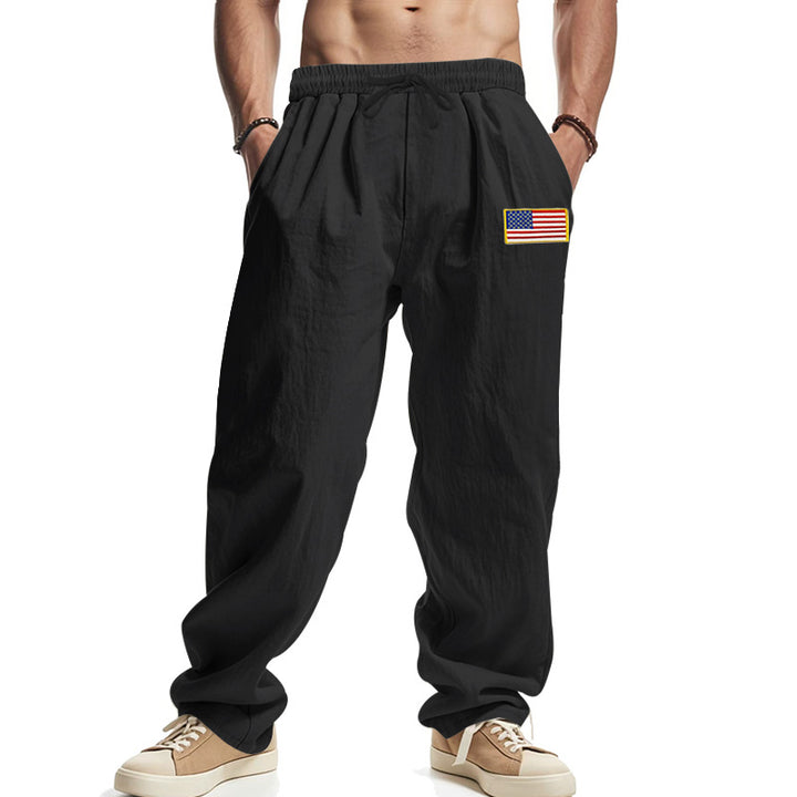 Herren Locker sitzende Freizeit-Hose im Leinen-Look mit elastischem Bund, Kordelzug & Flaggenpatch Drune
