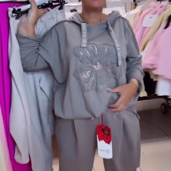 Damen nan entspanntes Lounge-Set mit Blüten-Pailletten-Hoodie, Kordelzug und weiter Bundfaltenhose Drune