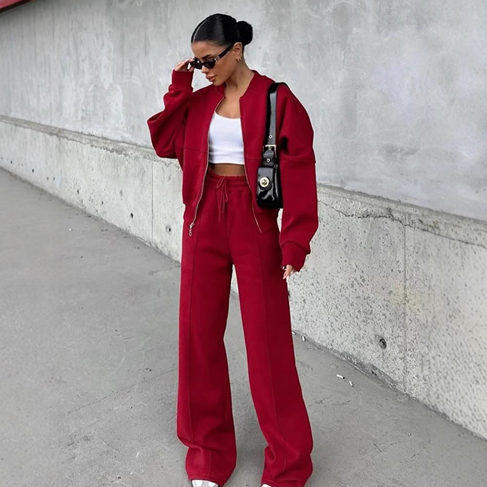 Damen sportive Oversize-Fleecejacke mit diagonaler Reißverschluss-Optik und weit geschnittener High-Waist-Jogginghose Drune