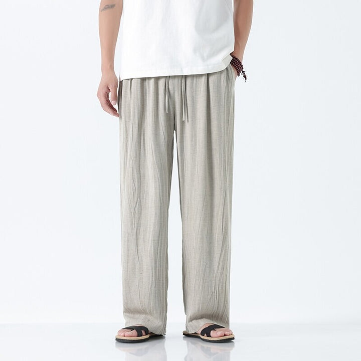 Herren nan weite Leinenhose mit verstellbarem Tunnelzugbund, lässiger Bundfaltenoptik und seitlichen Eingrifftaschen Drune