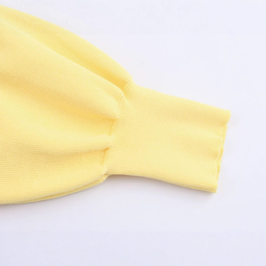 Damen Kurz geschnittener Strickcardigan mit Ballonärmeln und dekorativen Schmuckknöpfen Drune