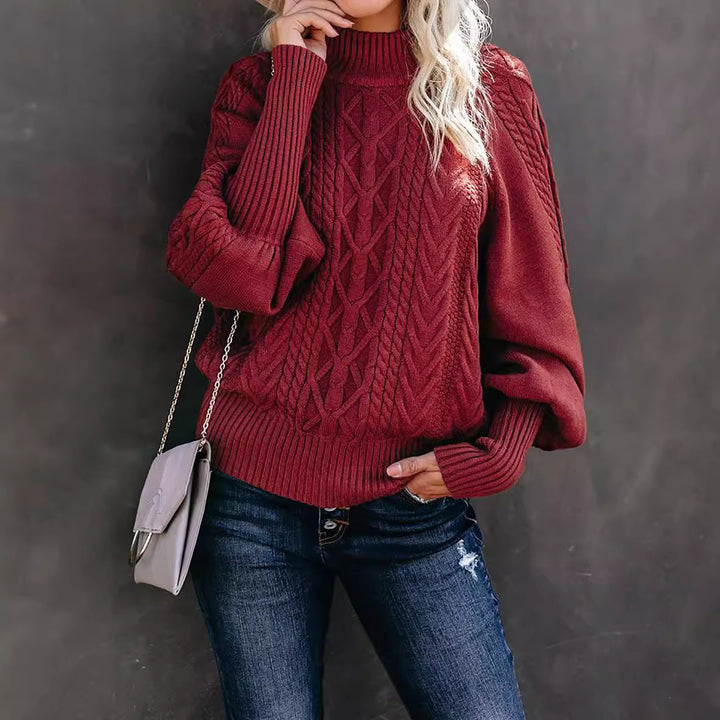 Damen Grobstrick-Pullover mit Zopfmuster, Stehkragen und Ballonärmeln Drune