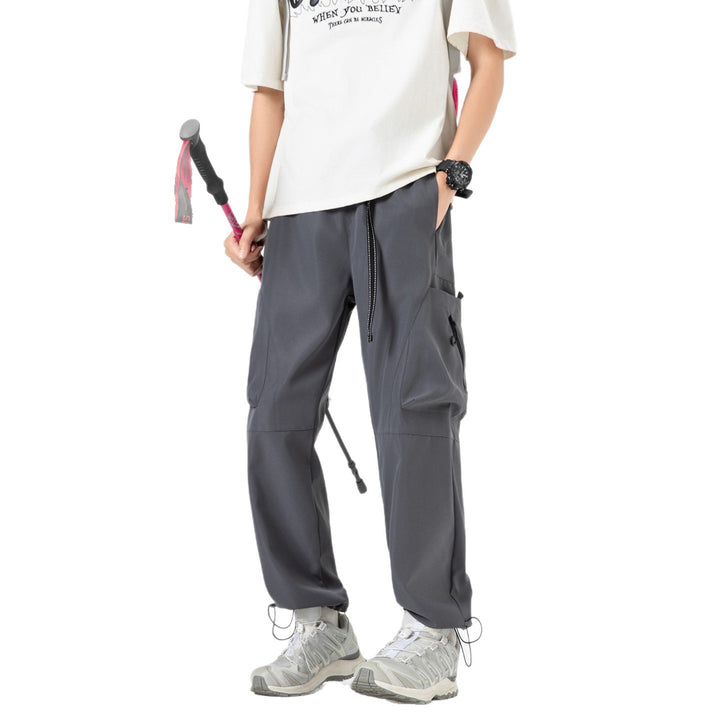 Herren Weite Cargo‑Hose im Baggy‑Stil mit Tunnelzugbund, großen Klapptaschen und verstellbaren Beinabschlüssen Drune