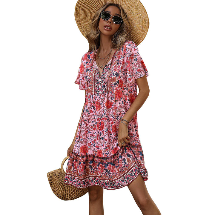 Damen Sommerliches Blumenkleid mit verspieltem Rüschensaum und Knopfdetail Drune