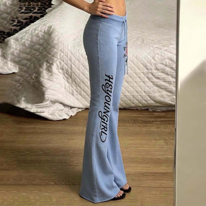 Damen nan ausgestellte Jersey-Sweathose mit Kordelzug, floralem Seitenprint und Statement-Schriftzug Drune