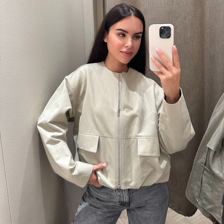 Damen modische Übergangsjacke mit großen Taschen und elastischem Bund Drune