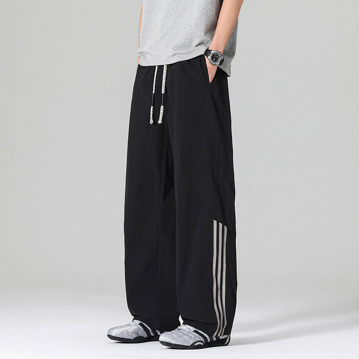 Herren Atmungsaktive Sporthose mit seitlichen Schlitzen