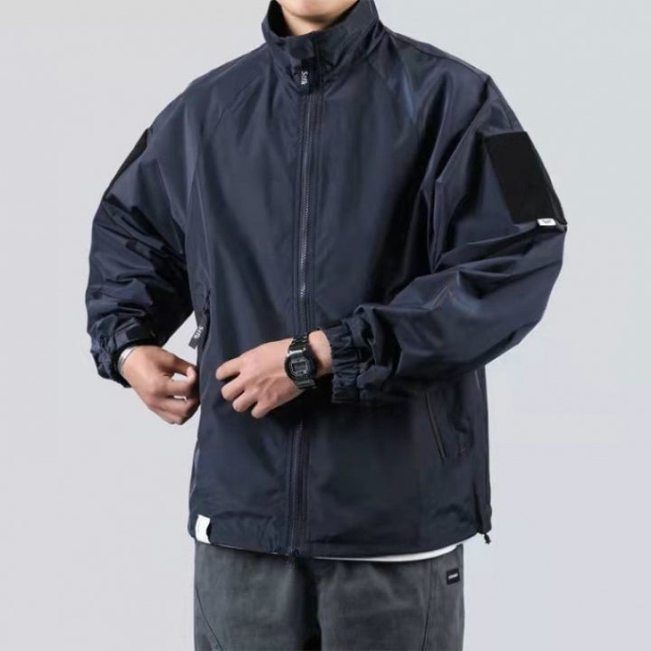 Herren Wind- und Wetterjacke mit funktionalen Taschen und hohem Kragen Drune