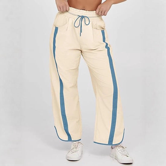 Damen nan relaxte Trackpants mit seitlichem Kontraststreifen, elastischem Smokbund und Eingrifftaschen Drune