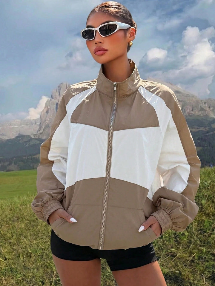 Damen Leichte Windbreaker-Jacke mit Stehkragen, Farbblock-Design und elastischen Bündchen Drune