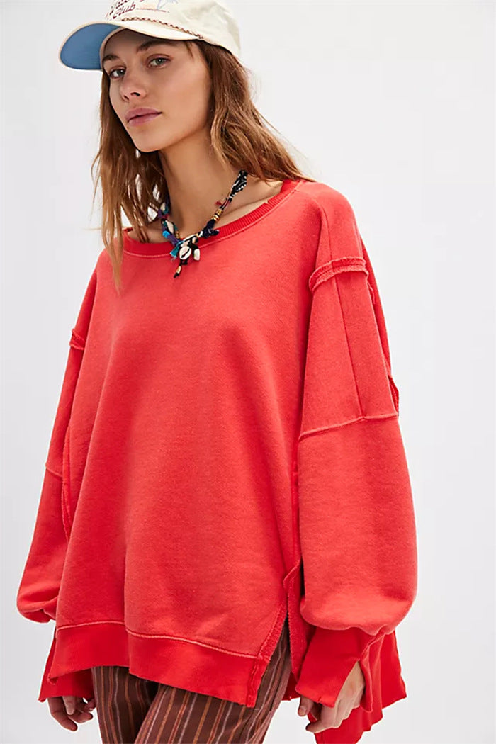 Damen oversized Sweatshirt mit Ballonärmeln, offenen Saumnähten und seitlichen Schlitzen Drune