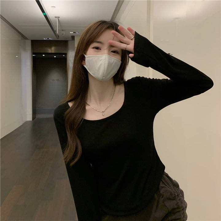 Damen Langarmshirt mit schickem Rundhalsausschnitt und figurbetontem Schnitt