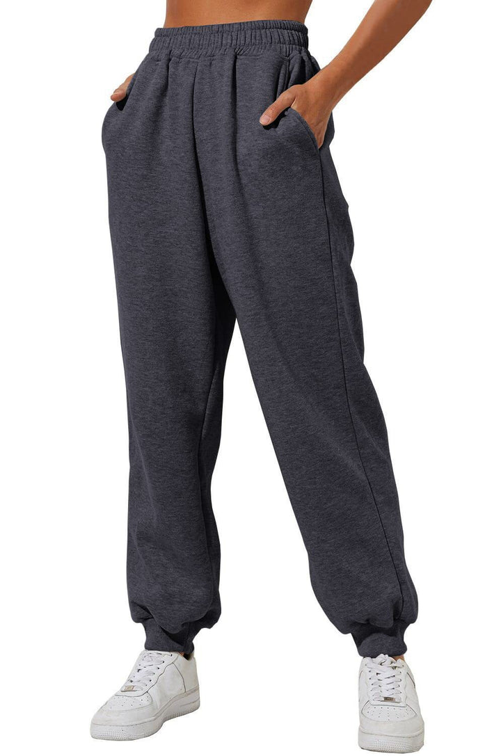 Damen nan weite High‑Waist Jogginghose mit soften Bügelfalten, elastischem Komfortbund und gerippten Knöchelbündchen Drune