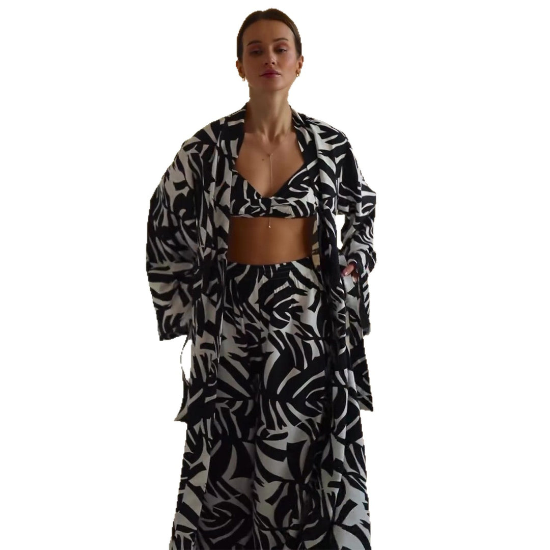 Damen Strandoutfit mit angesagtem floralem Muster Drune
