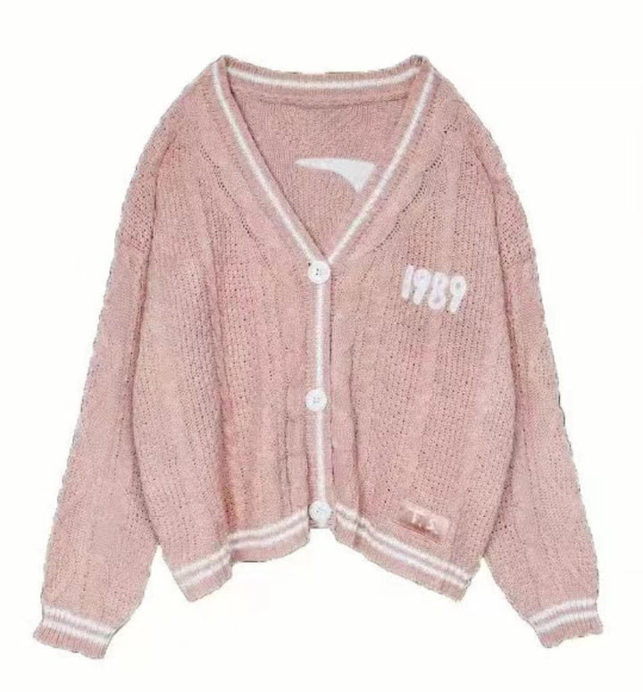 Damen nan kurz geschnittene Strickjacke mit V-Ausschnitt, Kontrastpaspel und oversized Ärmeln Drune