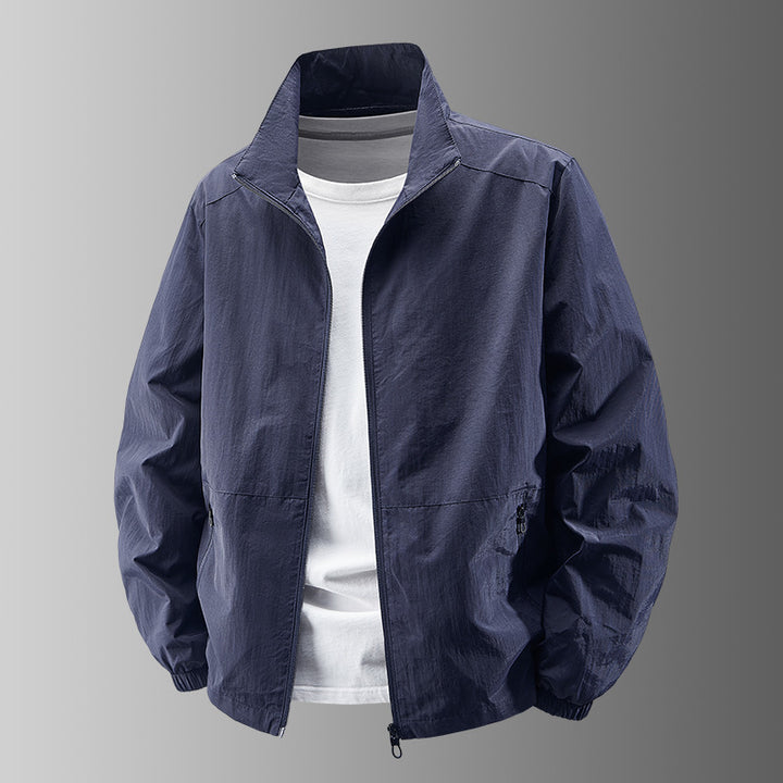 Herren nan atmungsaktive leichte Windjacke mit Stehkragen, elastischen Bündchen und verdeckten Reißverschlusstaschen Drune