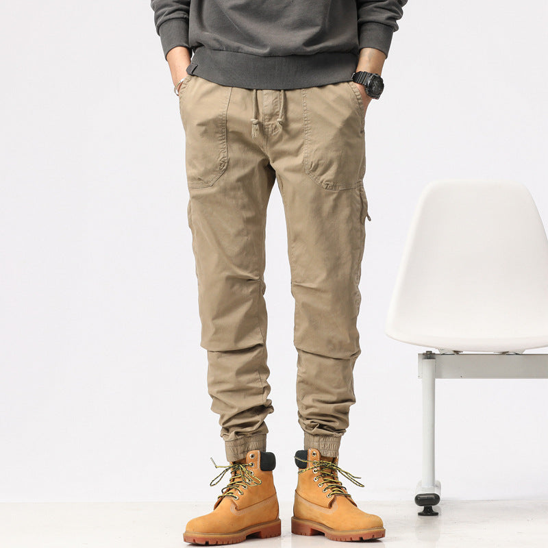 Herren Field-Joggerhose im Military-Workwear-Look mit Ziernähten, aufgesetzten Utility-Taschen und Kordelbund Drune