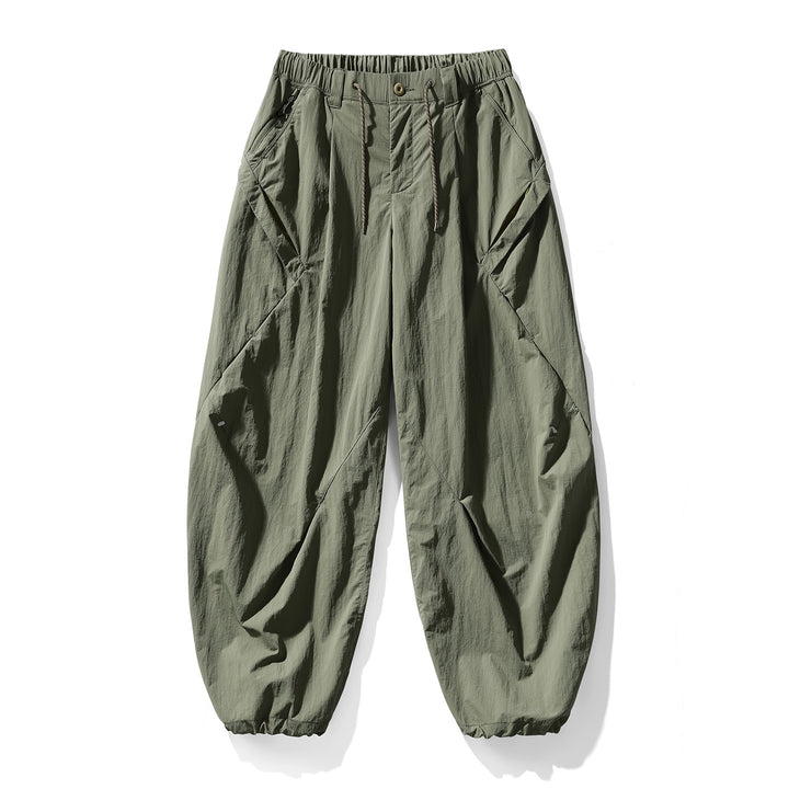 Herren Baggy-Cargohose mit asymmetrischen Eingriffstaschen, Tunnelzugbund und elastischen Knöchelabschlüssen Drune
