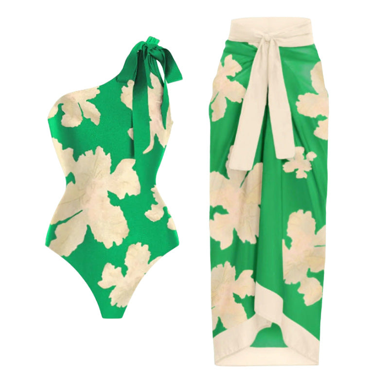 Damen Badeanzug mit voluminösen Flügelärmeln und passendem Wickelrock Drune