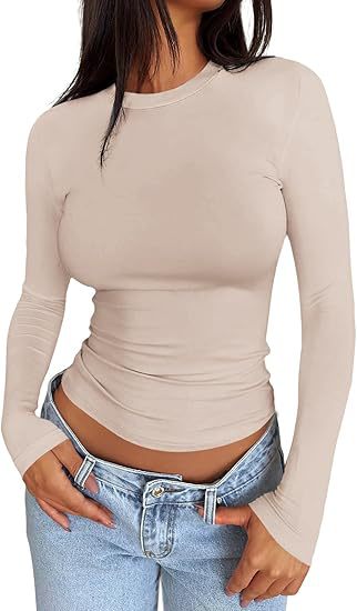 Damen Körpernahes Langarmshirt im Cropped-Look mit verlängerten Ärmeln und Daumenloch Drune
