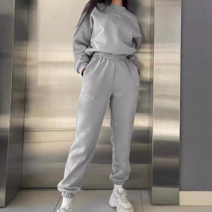 Damen hochgeschnittene Jogginghose mit elastischem Rüschenbund, tapered Bein und gerippten Knöchelbündchen Drune