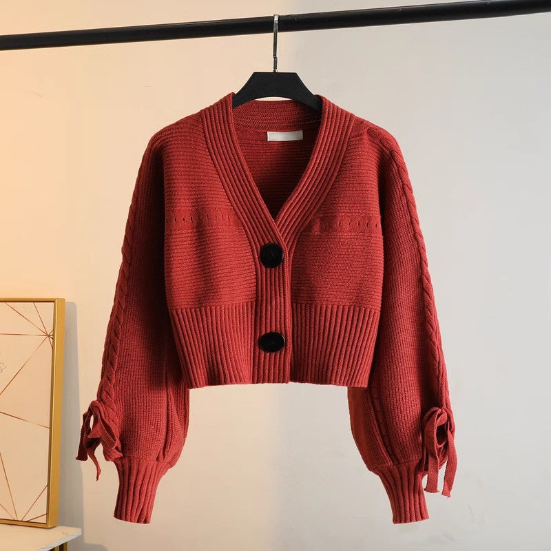 Damen modische Strickjacke mit voluminösen Ärmeln und Knopfdetails Drune