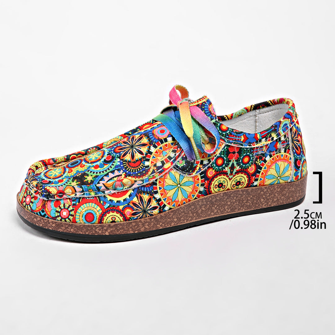 Damen Bequeme Plateau-Slipper im Ethno‑Print mit Korkoptik‑Sohle Drune