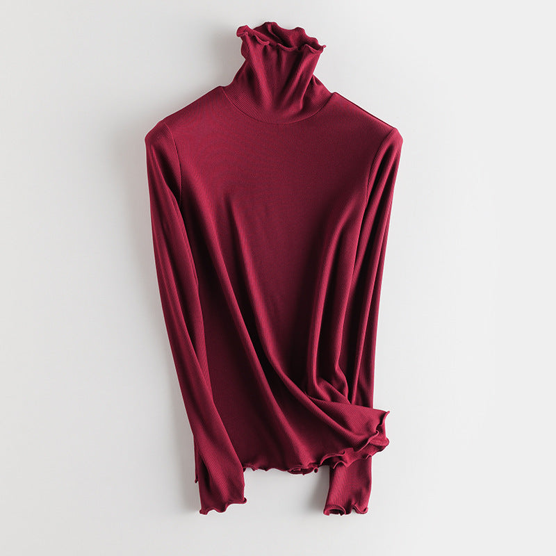 Damen Feines Ripp-Langarmshirt mit Rollkragen und Volantkanten Drune
