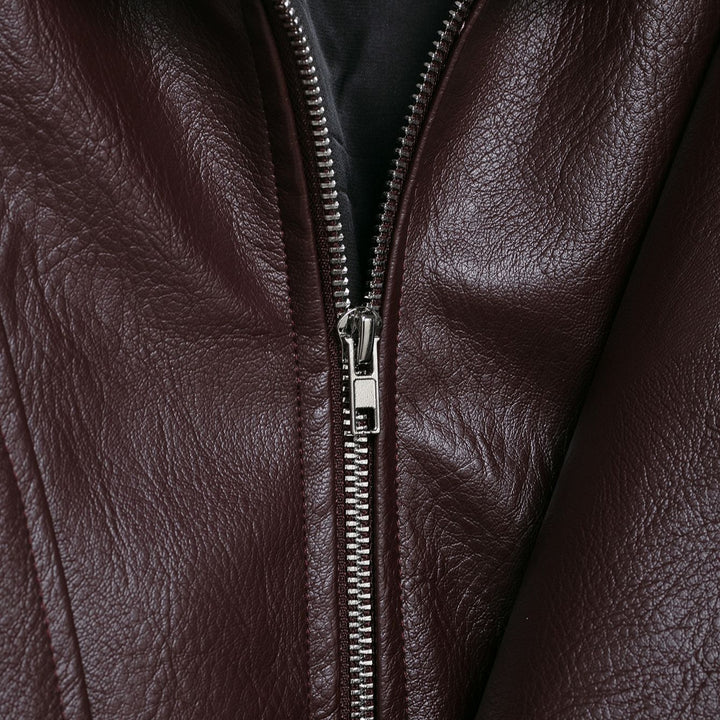 Damen modische Kunstlederjacke mit elegantem Schnitt und verstellbarem Taillengürtel Drune