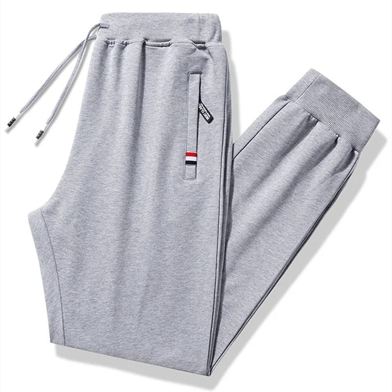 Herren Tapered-Jogginghose mit Tunnelzug, Reißverschlusstasche & Rippbündchen Drune