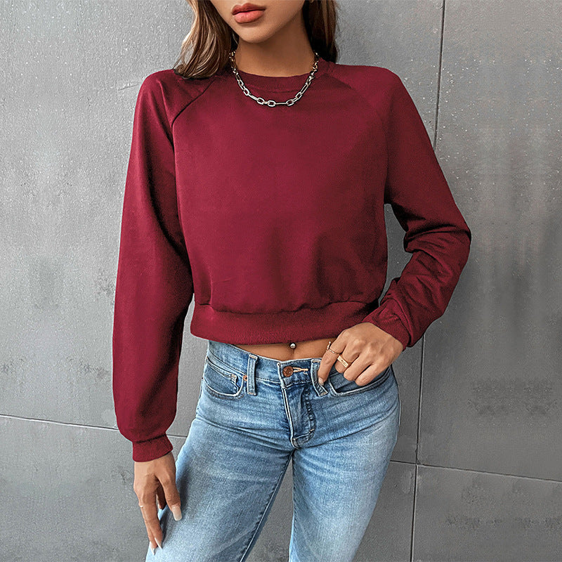 Damen Kurzes minimalistisches Sweatshirt mit Raglanärmeln und geripptem Saum Drune