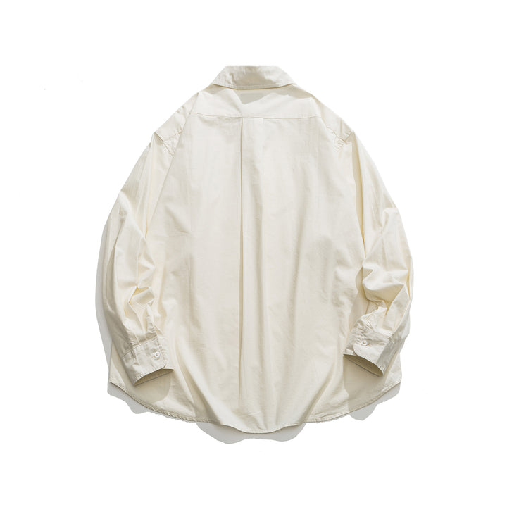 Unisex Oversized Hemdjacke mit seitlichen Zierknopfreihen und gerundetem Saum Drune