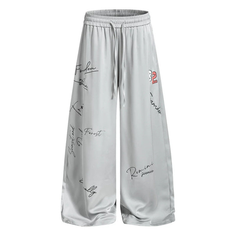 Damen Weite Satin-Palazzo-Loungehose mit Elastikbund, Kordelzug und Script-Print Drune