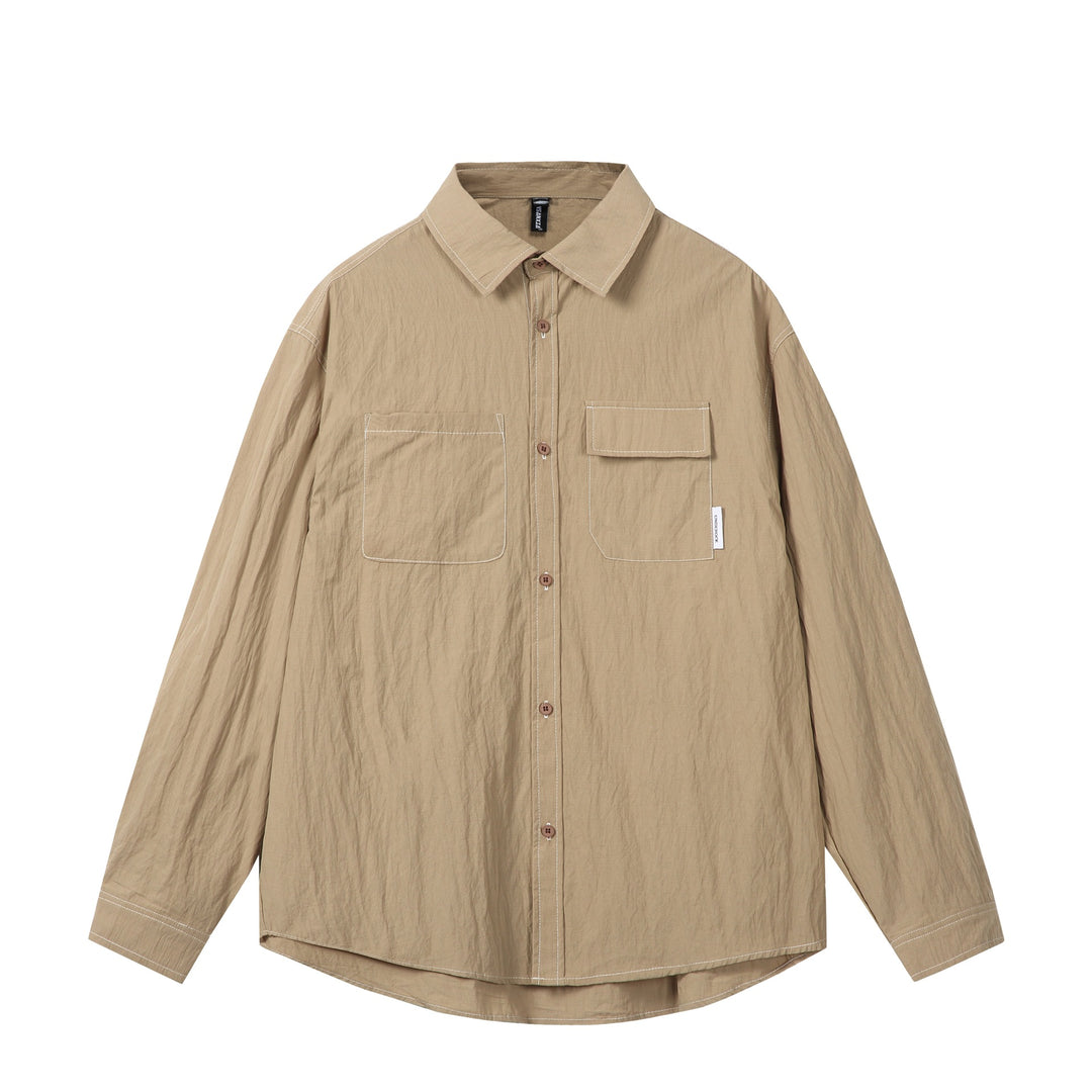 Unisex Oversize-Hemdjacke mit markanten Kontrastnähten und aufgesetzten Brusttaschen Drune