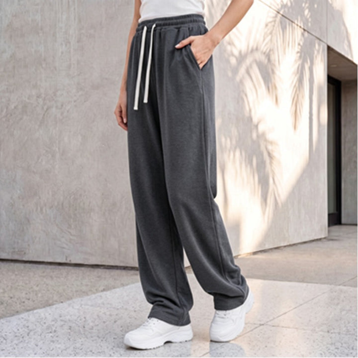 Damen nan weite Loungepalazzo-Hose mit hohem Komfortbund, Kordelzug, seitlichen Eingrifftaschen und dekorativer Seitennaht Drune