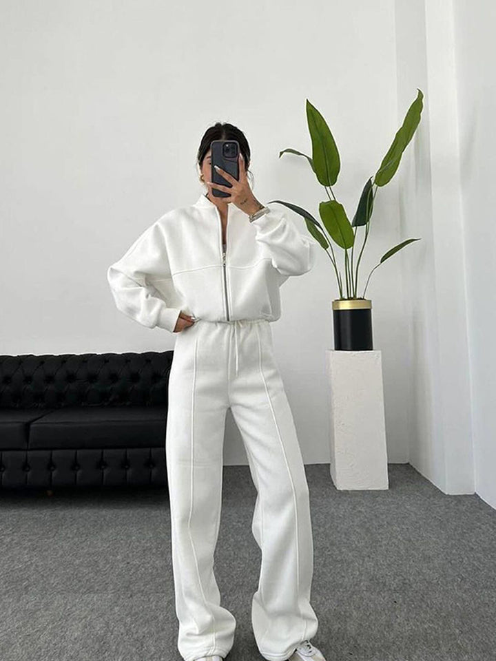 Damen sportive Oversize-Fleecejacke mit diagonaler Reißverschluss-Optik und weit geschnittener High-Waist-Jogginghose Drune