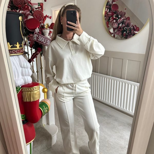 Damen eleganter Freizeitanzug mit hochgeschlossenem Kragen und weiten Hosen