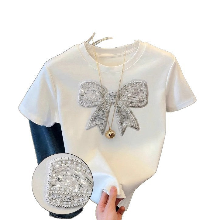 Damen T-Shirt mit glitzerndem Schleifenmotiv und feiner Sticktechnik Drune