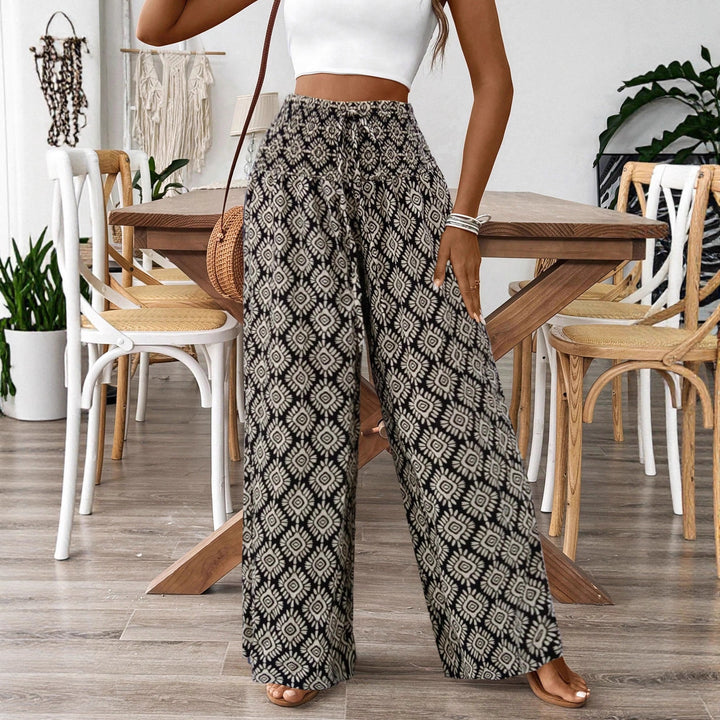Damen Weitgeschnittene Palazzohose mit elastischem Bund und verspieltem Muster Drune